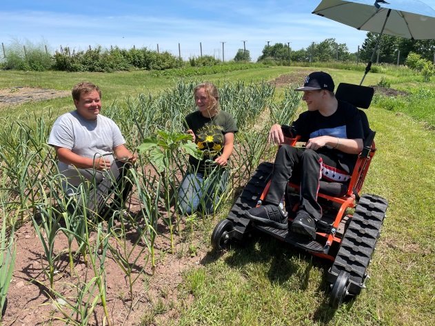Jay joins Anthony and Carly in the fields, using an adaptive action trackchair to get around at Hope Farm, a three-acre working organic farm.
